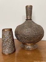 Water pot and matching cup side by side