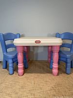 Front view of table with two chairs