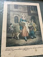 Front view of colored print showing street scene with woman, children, and dog in 18th century London attire in front of stone buildings.