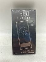 Front view of Enence Instant Translator box in original shrink wrap showing device image and branding.
