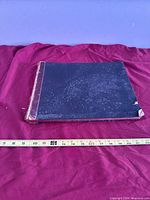 Front cover view showing cloth boards and wear