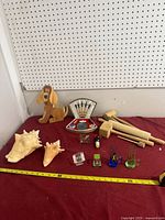 Group shot of all items laid out on red surface