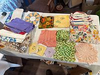 Overview of all folded textiles on table