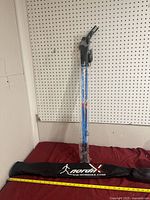 Full view of poles in packaging with carry bag laid out