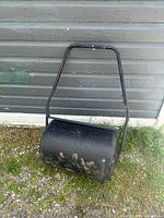 Full view of lawn roller against wall