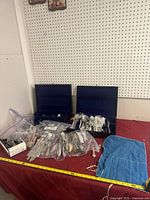 Overall view of flatware cases, roll-up and bags