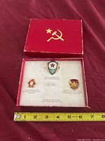 Box closed showing hammer and sickle emblem