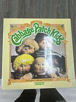 Front cover of the Cabbage Patch Kids 'Cabbage Patch Dreams' vinyl album showing artwork of four dolls.