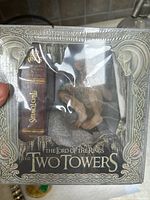 Front view of the Lord of the Rings Two Towers Special Extended Edition DVD with visible Gollum figurine in packaging.