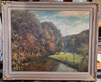 Full view of framed pastoral landscape painting