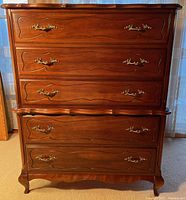 Front view showing five drawers and hardware