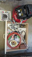Compressor, drawer of accessories including hose and fittings