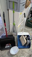 Full lot showing dustpans, rake, bowl