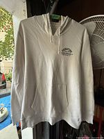 Front view of off-white Levi's Signature hoodie with kangaroo pocket