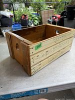 Overall view of crate showing painted exterior side and interior