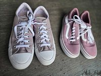 Top view of both sneaker pairs showing style and color