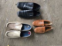 All three pairs of loafers displayed on floor