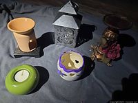 Group shot of five candle holders