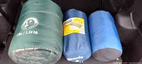 All three sleeping bags in stuff sacks