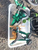 Tub containing multiple sprinklers and nozzle