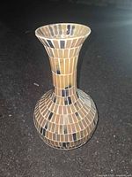Full view of mosaic vase standing upright