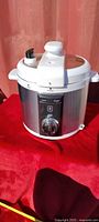 Full view of electric pressure cooker, lid latched