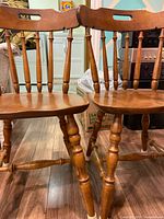 Pair of spindle-back chairs front view