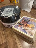 Salton VitaPro dehydrator beside Glorious Garnishes boxed kit