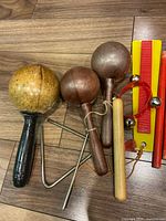 All instruments laid out on wood floor