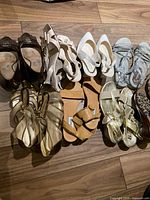 All eight pairs laid out on floor