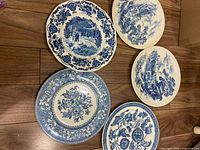 Group shot of all five blue and white plates