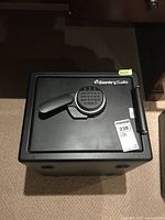 Top view of black SentrySafe safe showing keypad and handle