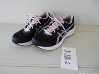 Lateral view of both shoes showcasing colour, design, and condition