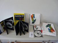 Overall view of book, disc folders, Adobe packaging