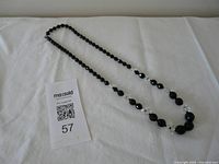 Full view of entire necklace laid flat