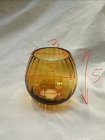 Ribbed tulip-form amber glass shade with dimensions indicated