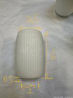 Single shade on its side with hand-written measurements showing length 6 in, outer diameter 2.5 in, fitter 2 in, lip 0.5 in