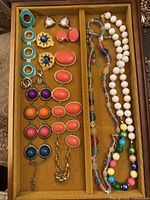 Overall view of all jewelry in tray