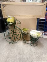 Full view of bicycle plant stand with three planters in place