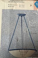 Box image showing assembled pendant fixture with details 150 W, 27" height, UL listed