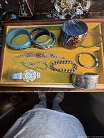 Tray overview showing all eleven jewelry pieces