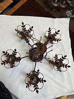 Top view showing six arms, sockets, leaf details, overall structure