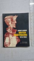 Front cover of the Avant-Garde British Printmaking 1914-1960 book showing an abstract figure and title text.