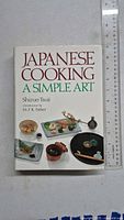 Front cover of the hardcover cookbook showing title, author, and Japanese cuisine images.