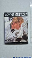 Front cover of the hardcover book showing Wayne Gretzky in a hockey uniform.