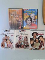 Photo of front covers of 5 classic comedy DVD cases featuring Carol Burnett Show, Burns and Allen Show, and Beverly Hillbillies.