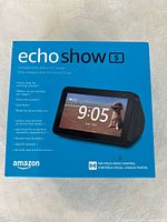 Front of the Amazon Echo Show 5 boxed packaging displaying product image, main features, and branding.