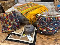 Overview of all lot items on wooden floor