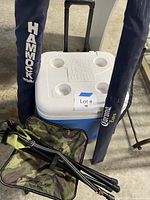 Igloo Ice Cube cooler, hammock bag, umbrella bag and folded stools