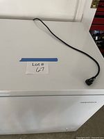 Top view showing full freezer lid and power cord